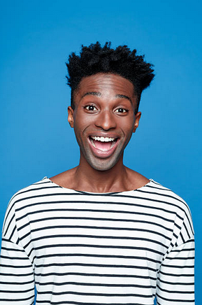 Cute boy in stripes on blue