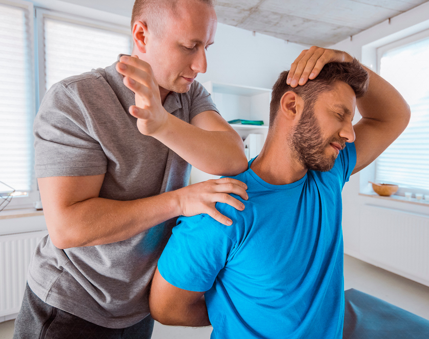 Young man visiting Physiotherapist